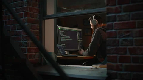 Man Working On Computer With Codding Language Interface 스톡 동영상 197421295