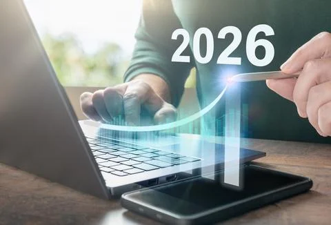 Man working on computer with digital hologram of statistics. Represents new y Fotos de archivo