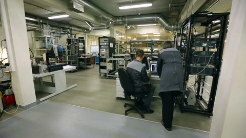 The man is working on the computer. Factory for the production of prosthetic Stock-Footage 95181284