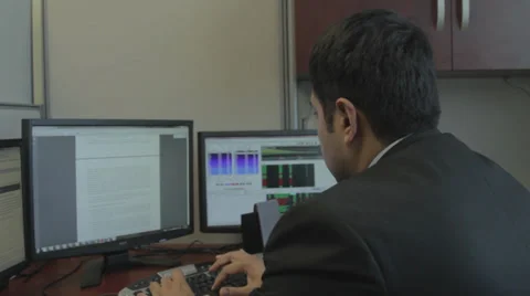 Man working on a computer Stock Footage 35720698