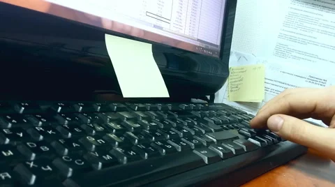 A man working at the computer Stock Footage 59754948