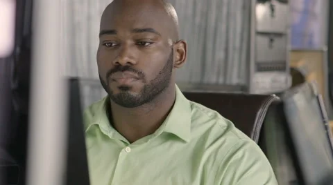 Man working on computer Stock Footage 61955386