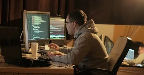 Man working on computer Stock Footage 83885817