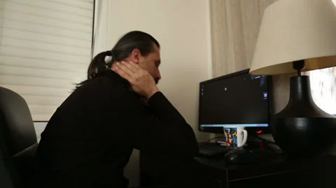 Man working computer having neck pain  Stock Footage 33784452
