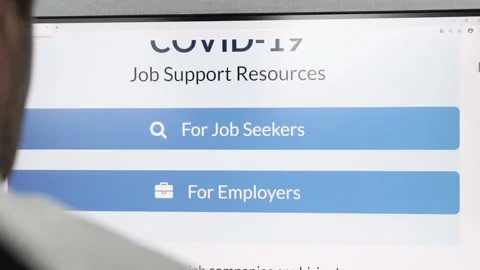 Man working on computer at home and looking for a new job as a sales manager Stock Footage 130501210