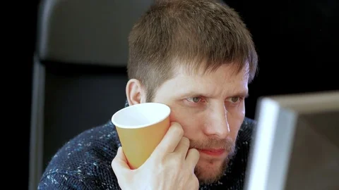 Man working on a computer in an office. Stock Footage 73988341