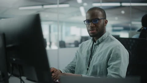 Man Working on Computer in Office Stock Footage 159549167
