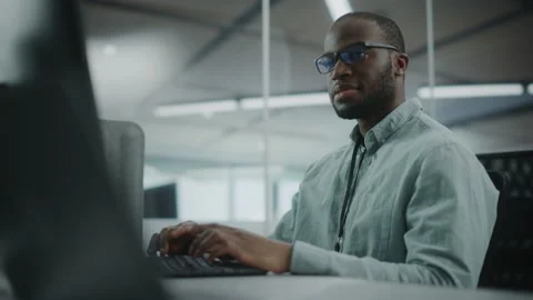 Man Working on Computer in Office Stock Footage 159549234
