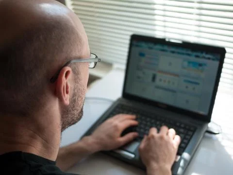 Man working on computer Stock Photos