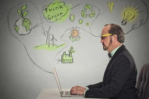 Man working on computer solving ecology problem Stock Photos