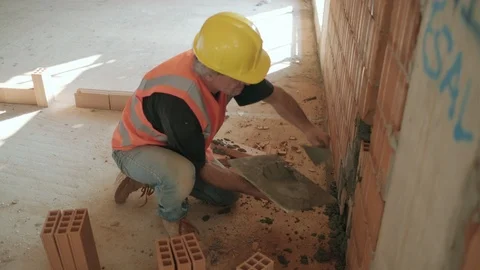 Man Working In Construction Site With Bricks Tools Cement Stock Footage 98282081