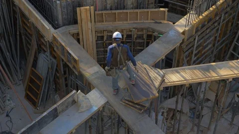 A man is working on the construction site. Stock Footage 85419412