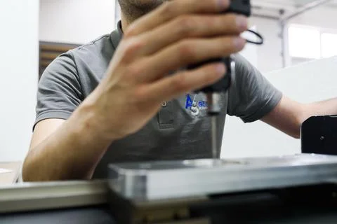 Man Working On Coordinate Measuring Machines. Stock Photos