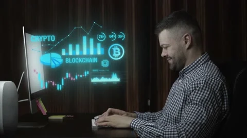 Man working with crypto currency data on desktop computer Stock Footage 167549495