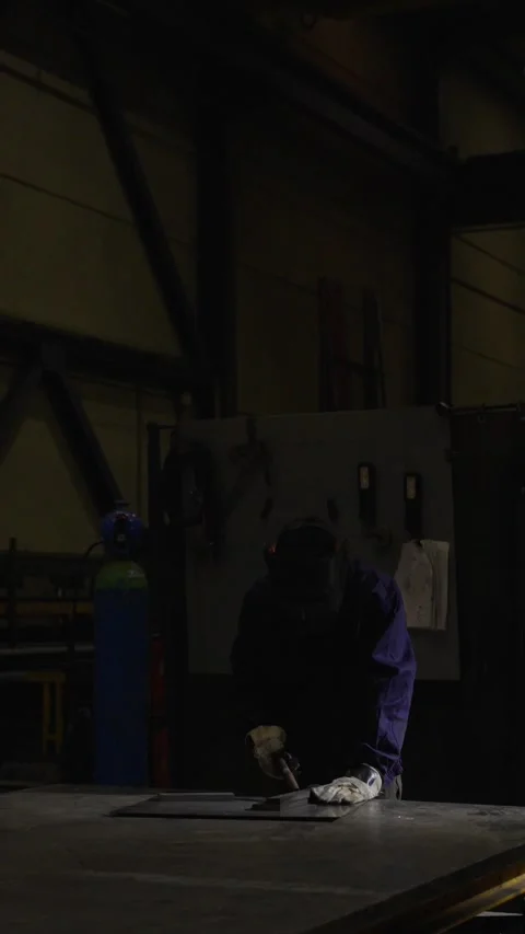 Man working in a dark factory Video stock 266070610