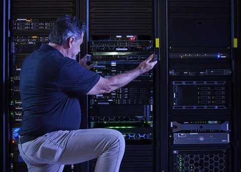 Man working in data center Stock Photos