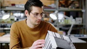 Man working in design and engineering architecture office Stock Footage 85877810