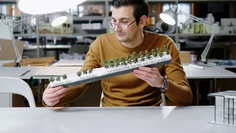 Man working in design and engineering architecture office Stock Footage 86361857