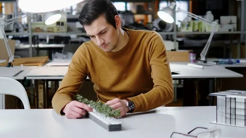 Man working in design and engineering architecture office Stock Footage 86791624