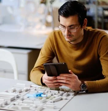 Man working in design and engineering architecture office Stock Photos