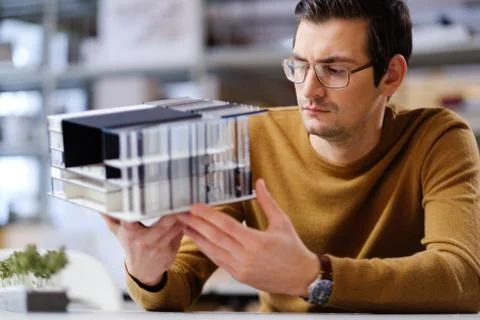 Man working in design and engineering architecture office Stock Photos