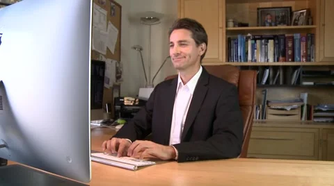 Man working at desk in office Stock Footage 40799717