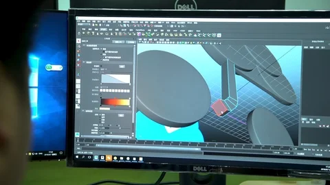 A man working on a digital three dimensional design Chinese software Stock Footage 96225739