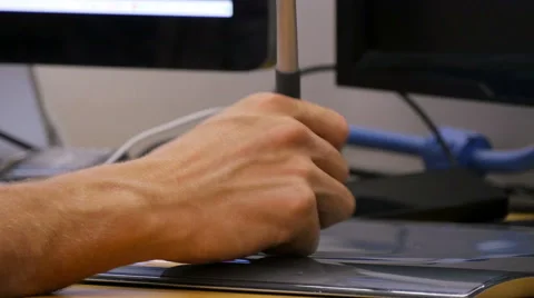 Man working with drawing tablet for a computer HD Stock Footage 41794418