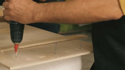 Man working on a drilling machine Stock Footage 167708055