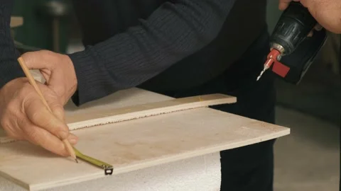 Man working on a drilling machine Stock Footage 167708215