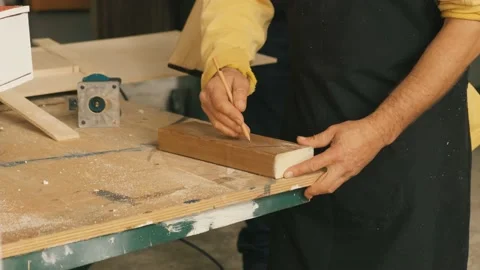 Man working on a drilling machine Stock Footage 167708594
