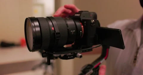 Man working DSLR Camera on Stabilizer Stock Footage 225728868
