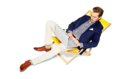 Man Working During Vacation Stock Photos