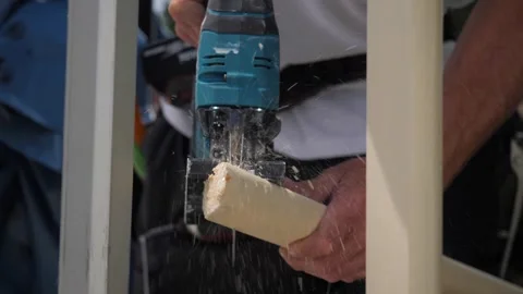 A man is working with electric jigsaw Video stock 265680856