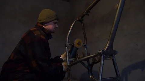 Man working with electric saw. Working in garage Stock Footage 124360710