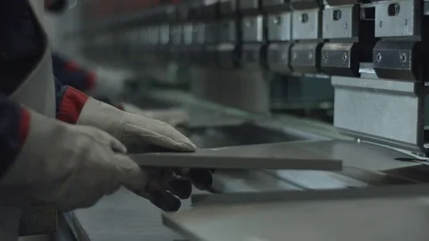 Man working in a factory Close up Stockbeeldmateriaal 75166411