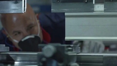 Man working in a factory Close up 動画素材 75166438