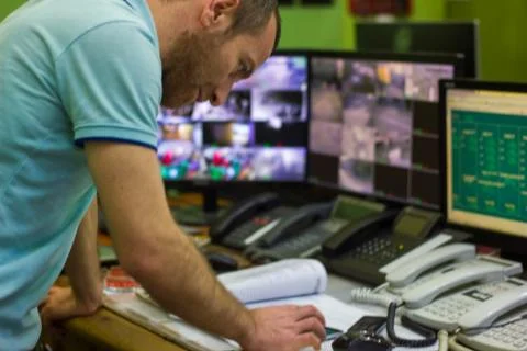 Man working in a factory, engineer at work Stock Photos