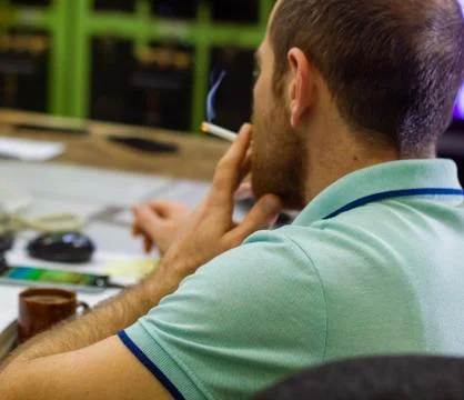 Man working in a factory, engineer at work Stock Photos