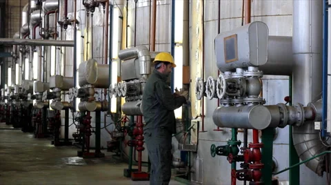 Man working in a factory Stock Footage 943617