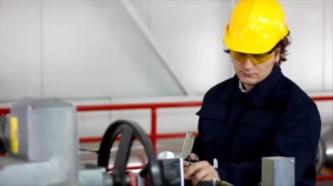 Man working in a factory Stock Footage 996987