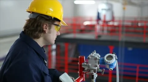 Man working in a factory Stock Footage 24651936