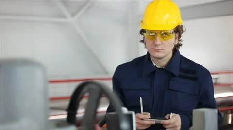 Man working in a factory Stock Footage 24651940
