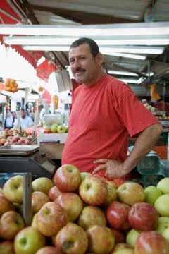 A man working on a fruit stall Stock Photos