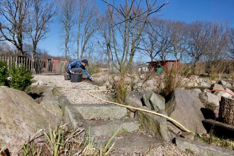Man working in garden Stock Photos