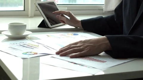 Man working with graph in the office Stock Footage 84470554