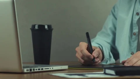 Man working with graphics tablet, hands of man working with drawing tablet Stock Footage 81880246