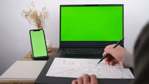 Man working green screen computer and phone Stock Footage 236405122
