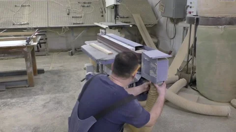 Man working on a grinding machine Stock Footage 60567481