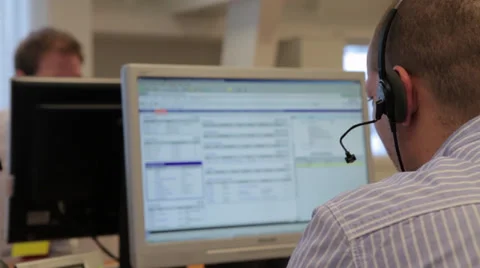 Man working on helpdesk Stock Footage 39832861